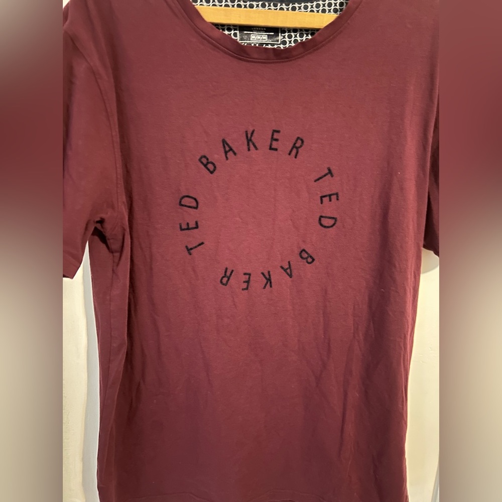 Ted Baker size medium dark red/burgundy circle spell out logo t shirt.